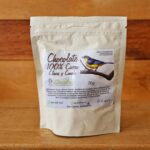 Imagen de chocolate en media esfera de 70g, elaborado con cacao puro infusionado con clavos y canela.